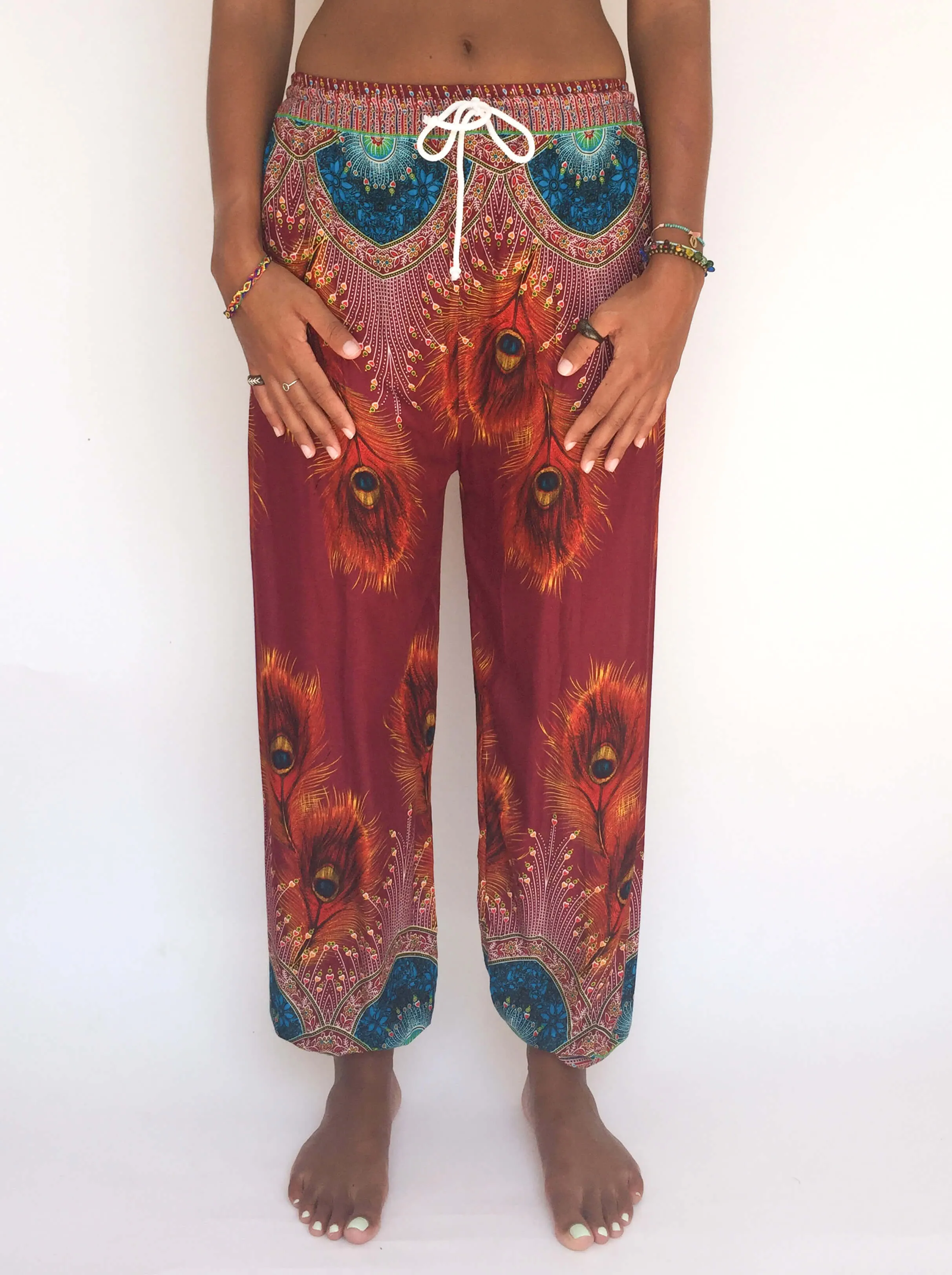 Drawstring pants with feather pattern