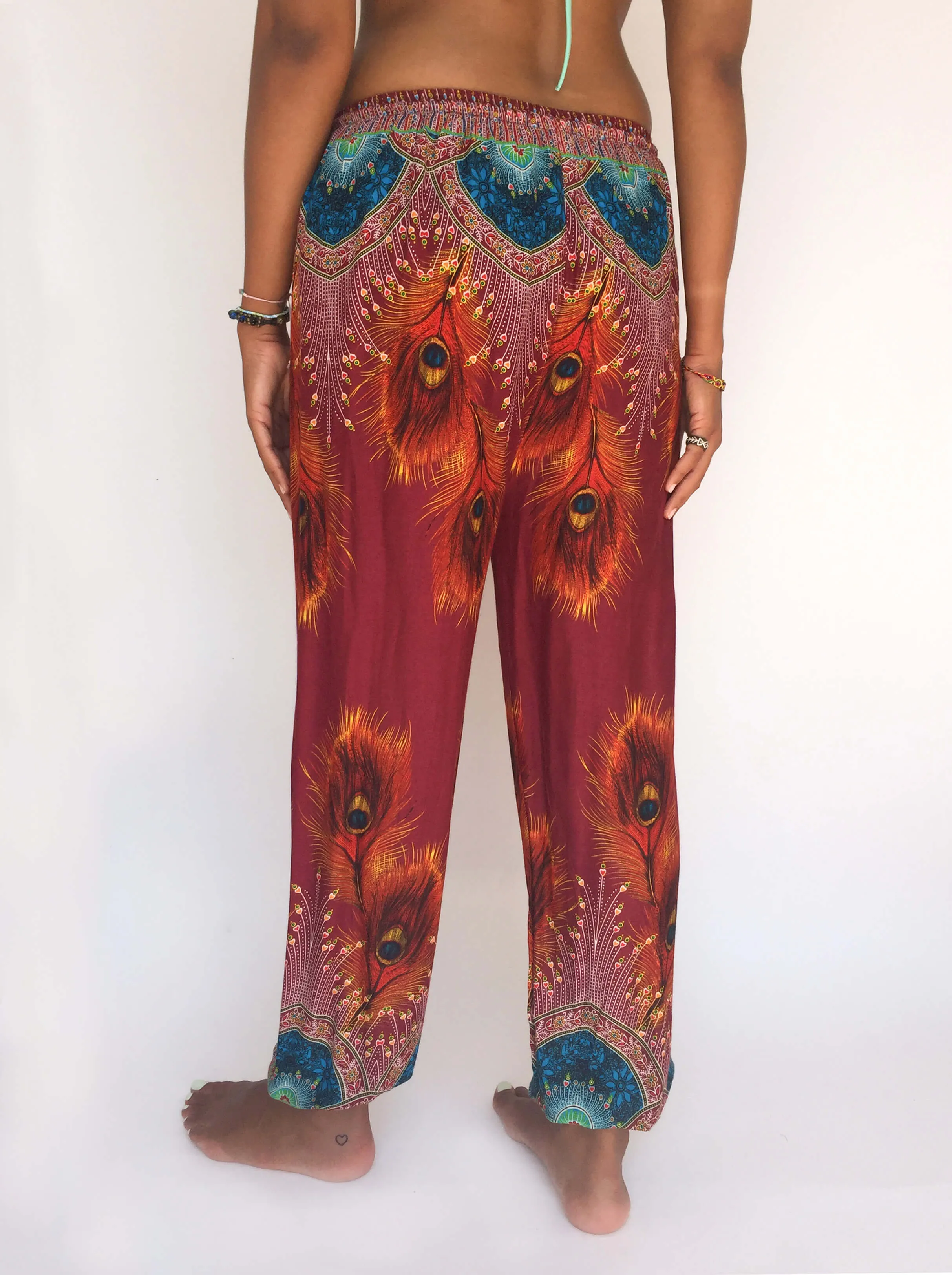 Drawstring pants with feather pattern