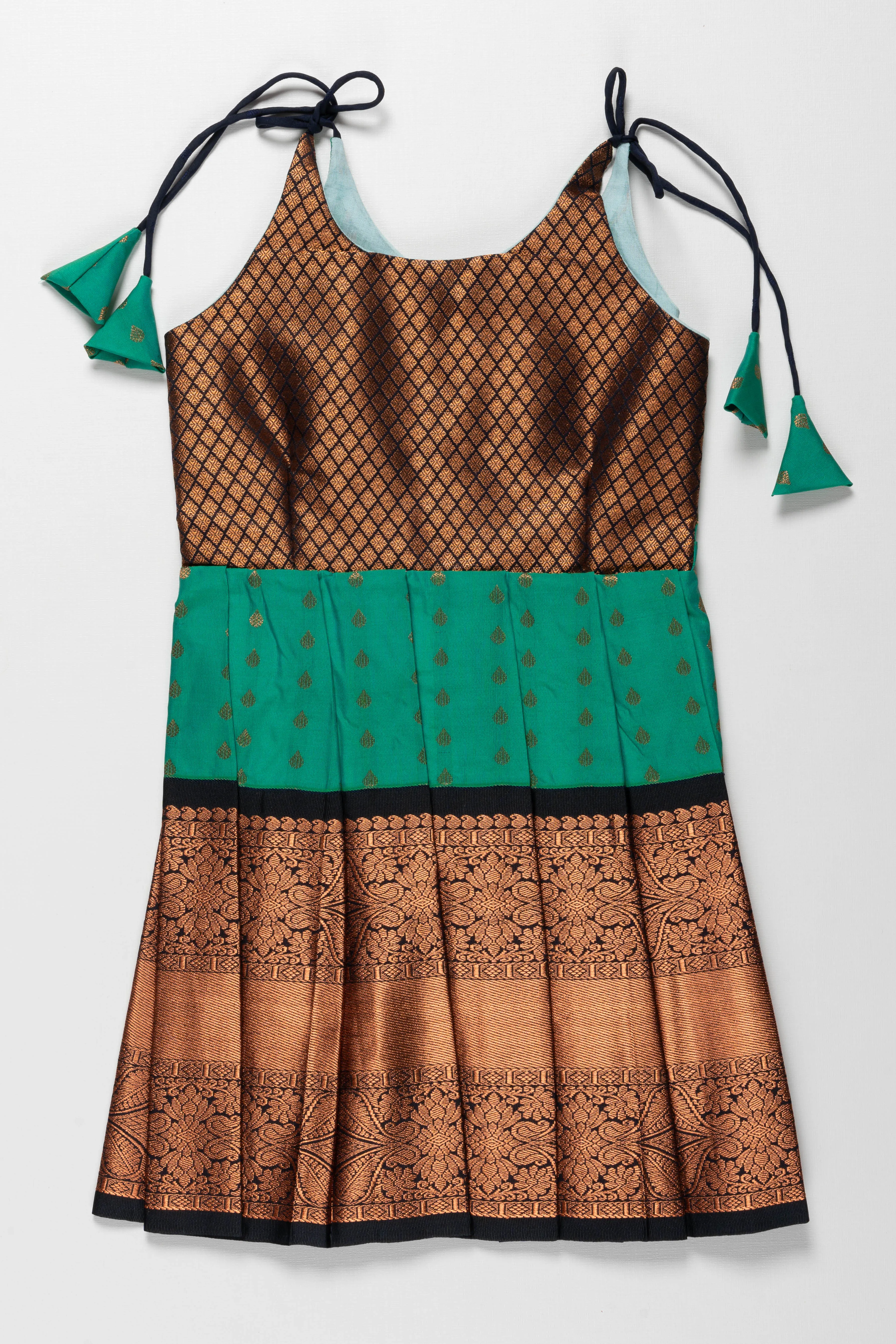 Enchanting Green and Bronze Silk Knot-Tie Frock for Ayush Homam and Noolukettu: A Blend of Tradition