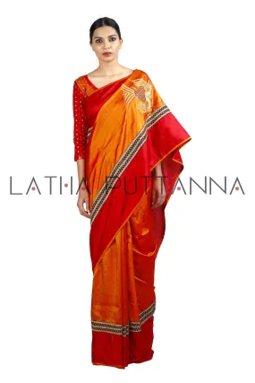 Gandberunda  -  Orange Silk saree  with beautiful thread woven pallu